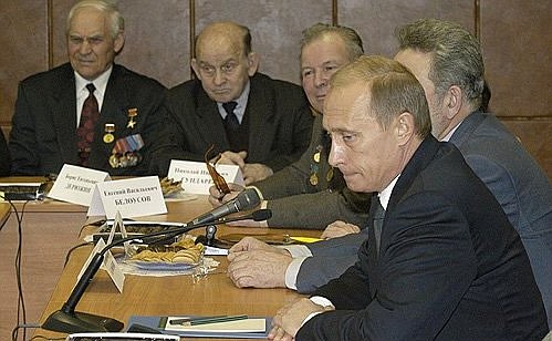 President Putin meeting with pensioners.