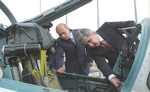President Putin and Mikhail Pogosyan, CEO of the Sukhoi Aviation Military-Industrial Complex, examining equipment at the sixth MAKS-2003 International Aerospace Show.