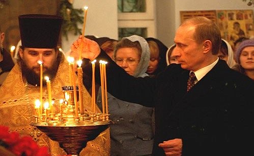 President Putin during the Christmas service at the Church of Our Lady of Vladimir in the village Agapovka.