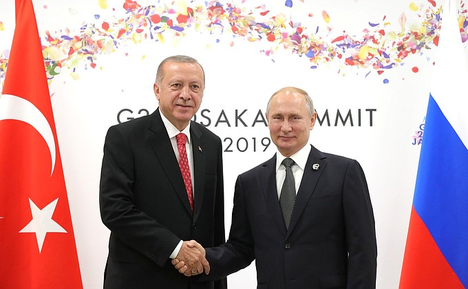 C Президентом Турецкой Республики Реджепом Тайипом Эрдоганом.