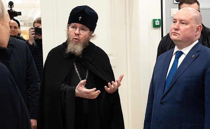 Metropolitan Tikhon (Shevkunov) of Pskov and Porkhov, chairman of the Patriarchal Council for Culture and Governor of Sevastopol Mikhail Razvozhayev (on the right).