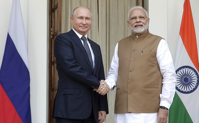With Prime Minister of India Narendra Modi before the beginning of Russian-Indian talks.