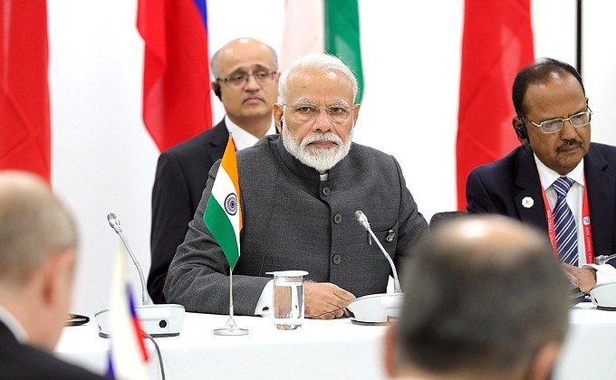 With Prime Minister of the Republic of India Narendra Modi at the meeting between leaders of Russia, India and China.