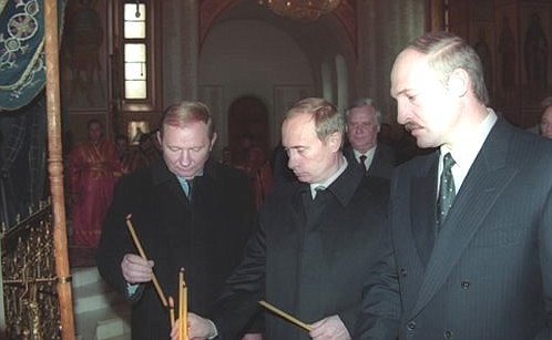 Vladimir Putin with presidents Leonid Kuchma of Ukraine and Alexander Lukashenko of Belarus (to the right), in Sts. Peter and Paul\'s Church in Prokhorovka Field.