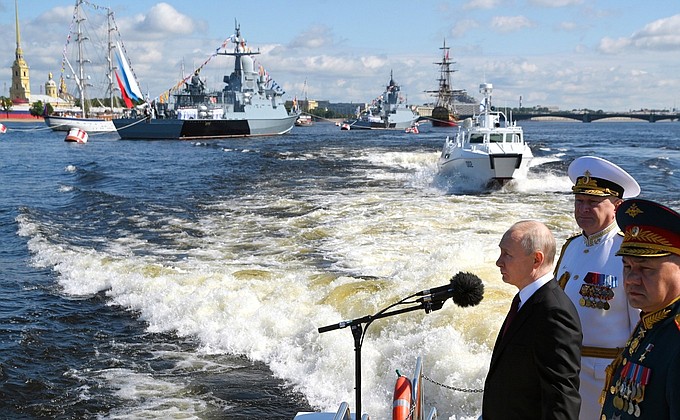 The Supreme Commander-in-Chief from a cutter reviewed fleet formations, lined up for the parade.