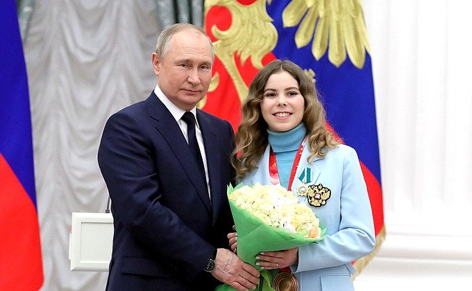 At ceremony for presenting state decorations to gold medallists of the XXIV Olympic Winter Games in Beijing. Anastasia Mishina, the 2022 Winter Olympics gold medallist in team figure skating event, bronze medallist in pair skating, Merited Master of Sport of Russia, is awarded the Order of Friendship.