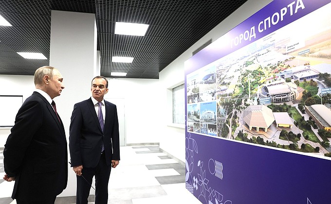 The President took a look at information stands about the prospects for developing the Sports City project. With Governor of Krasnodar Territory Veniamin Kondratyev.
