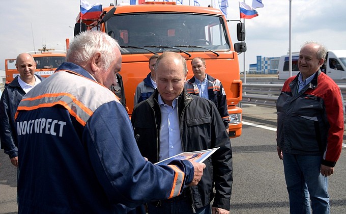 With builders of the Crimean Bridge.