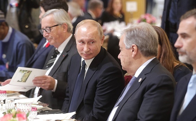 With Secretary-General of the United Nations Antonio Guterres (right) and President of the European Commission Jean-Claude Juncker at the working breakfast at the Elysee Palace.