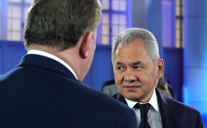 Defence Minister Sergei Shoigu (right) before the Presidential Address to the Federal Assembly.