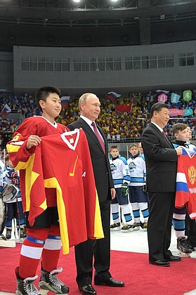 Before the beginnig of hockey match between youth teams of Russia and China.
