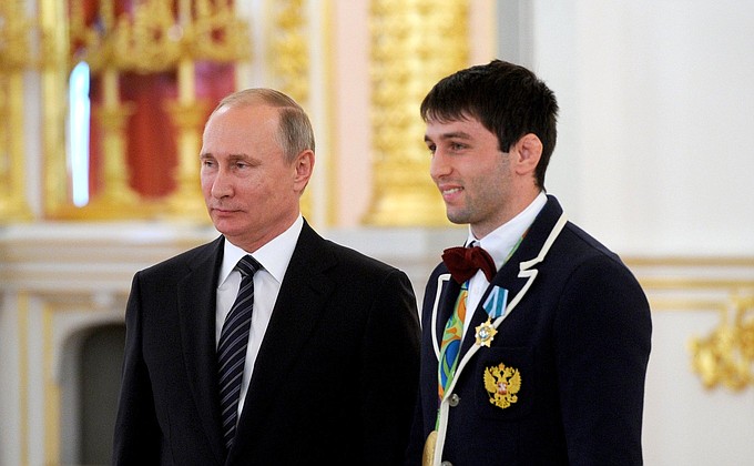 С олимпийским чемпионом по вольной борьбе Сосланом Рамоновым.