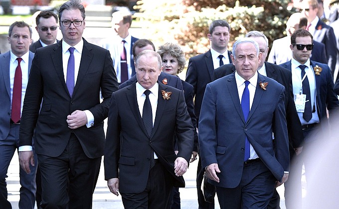 With Prime Minister of Israel Benjamin Netanyahu and President of Serbia Aleksandar Vucic (left) before the military parade marking the 73rd anniversary of Victory in the 1941–45 Great Patriotic War.