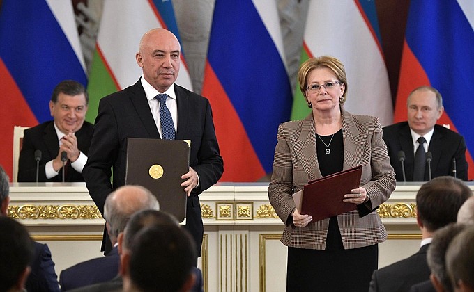 At a ceremony for exchanging the documents signed following Russian-Uzbekistani talks.