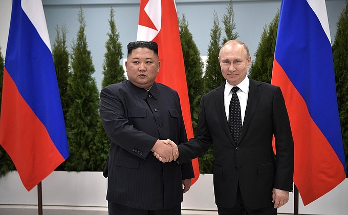 With Chairman of the State Affairs Commission of the Democratic People’s Republic of Korea Kim Jong-un.