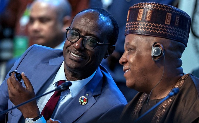 Minister of State for Foreign Affairs and International Cooperation of Rwanda Manasseh Nshuti (left) and Vice President of Nigeria Kashim Shettima at the plenary session of the Russia-Africa Summit.