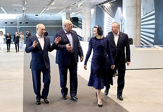 Vladimir Putin and Alexander Lukashenko visit the Museum of Naval Glory. With Governor of St Petersburg Alexander Beglov (right) and head of the Island of Forts cluster project office Kseniya Shoigu.