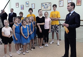 During a visit to the Palace of Creativity for Children and Teenagers.