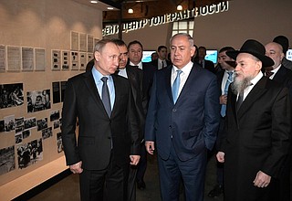 During a tour of the Jewish Museum and Tolerance Centre. With Prime Minister of Israel Benjamin Netanyahu and President of the Federation of Jewish Communities Alexander Boroda (right).