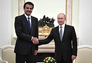 With Emir of Qatar Tamim bin Hamad Al Thani.