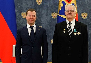 Presenting Russian state decorations to foreign citizens. Alexander Volkov, head of the Russian community of Ivano-Frankivsk Region (Ukraine), receives the Order of Friendship.