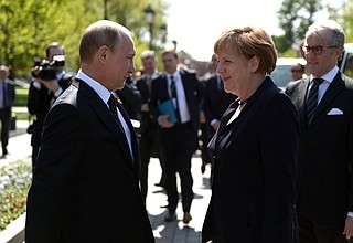 Walking in the Alexander Garden. With German Federal Chancellor Angela Merkel.