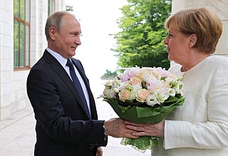 German Federal Chancellor Angela Merkel arrives for talks with President of Russia Vladimir Putin.
