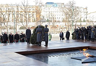 During the wreath-laying ceremony at the Tomb of the Unknown Soldier.