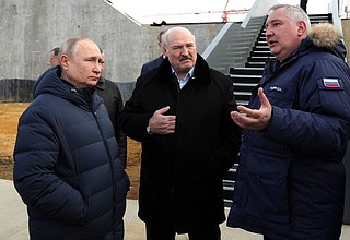 Visiting the construction site of a facility for putting Angara booster vehicles into orbit. With President of the Republic of Belarus Alexander Lukashenko and General Director of Roscosmos State Corporation Dmitry Rogozin.