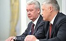 Acting Mayor of Moscow Sergei Sobyanin (left) and First Deputy Chairman of the Investigative Committee Vasily Piskarev.