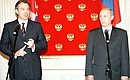 A news conference with President Putin and British Prime Minister Tony Blair.