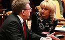 Deputy Prime Minister and Finance Minister Alexei Kudrin and Healthcare and Social Development Minister Tatyana Golikova before the meeting on improving labour conditions.