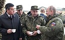 At the Donguz training ground. With President of Kyrgyzstan Sooronbay Jeenbekov (left), Defence Minister of Russia Sergei Shoigu and Chief of the General Staff of the Russian Armed Forces and First Deputy Defence Minister Valery Gerasimov.