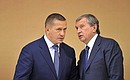 Before the meeting on developing the electricity sector in Siberia and the Far East. Presidential Aide Yury Trutnev (left) and Rosneft CEO Igor Sechin.