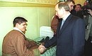 Vladimir Putin visiting a military hospital in Nizhny Novgorod.