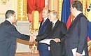 Turkish Ambassador Kurtulus Taskent presenting his credentials to President Putin.