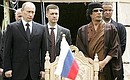 At the ceremonial signing of Russian-Libyan documents.