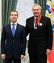 Presenting state decorations. Vitaly Ignatenko, director general of the Information Telegraph Agency of Russia (ITAR-TASS), was awarded the Order for Services to the Fatherland, II degree.
