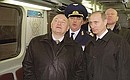 Unveiling a new station of the new Moscow Metro station Annino. Vladimir Putin, Yury Luzhkov and Dmitry Gayev, head of the Moscow Metro, examining the new-generation high-speed train “Yauza”.