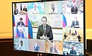 Participants in the meeting with representatives of various economy sectors affected by the spread of the coronavirus (via videoconference).
