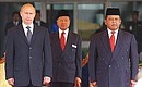 The official welcoming ceremony for the Russian President. President Putin with Malaysian Prime Minister Mahathir Mohamad and King Tuanku Syed Sirajuddin, right.