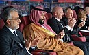 Владимир Путин, президент ФИФА Джанни Инфантино и Наследный принц Саудовской Аравии Мухаммед Бен Сальман Аль Сауд (справа налево) на церемонии открытия чемпионата мира по футболу 2018 года.