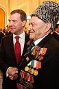 С ветеранами на торжественном приёме по случаю 65-летия Победы в Великой Отечественной войне.