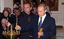President Putin at a funeral service for Sakhalin Regional Governor Igor Farkhutdinov and members of the regional government killed in a helicopter crash on August 20, 2003.