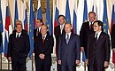 Photo session of participants in Russia — EU Summit. From left to right, first row: Italian Prime Minister Silvio Berlusconi, Greek Prime Minister Konstandinos Simitis, Russian President Vladimir Putin, President of the European Commission Romano Prodi. From left to right, second row: President of Cyprus Tassos Nikolaou Papadopoulos, Prime Minister of Luxembourg Jean-Claude Juncker and Swedish Prime Minister Goran Persson.