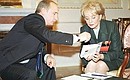 President Putin giving an interview to ABC (American Broadcasting Company). By request of ABC journalist Barbara Walters, President Putin signed his book, “First Person,” published in the US.