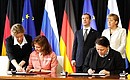 Signing of joint documents following Russian-German interstate consultations.