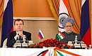 News conference following Russian-Indian talks. With Indian Prime Minister Manmohan Singh.