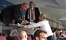 Владимир Путин посетил финальный матч чемпионата мира по футболу 2018 года. С главным тренером сборной России по футболу Станиславом Черчесовым.