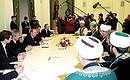 Vladimir Putin\'s meeting with members of the Council of Muftis of Russia.